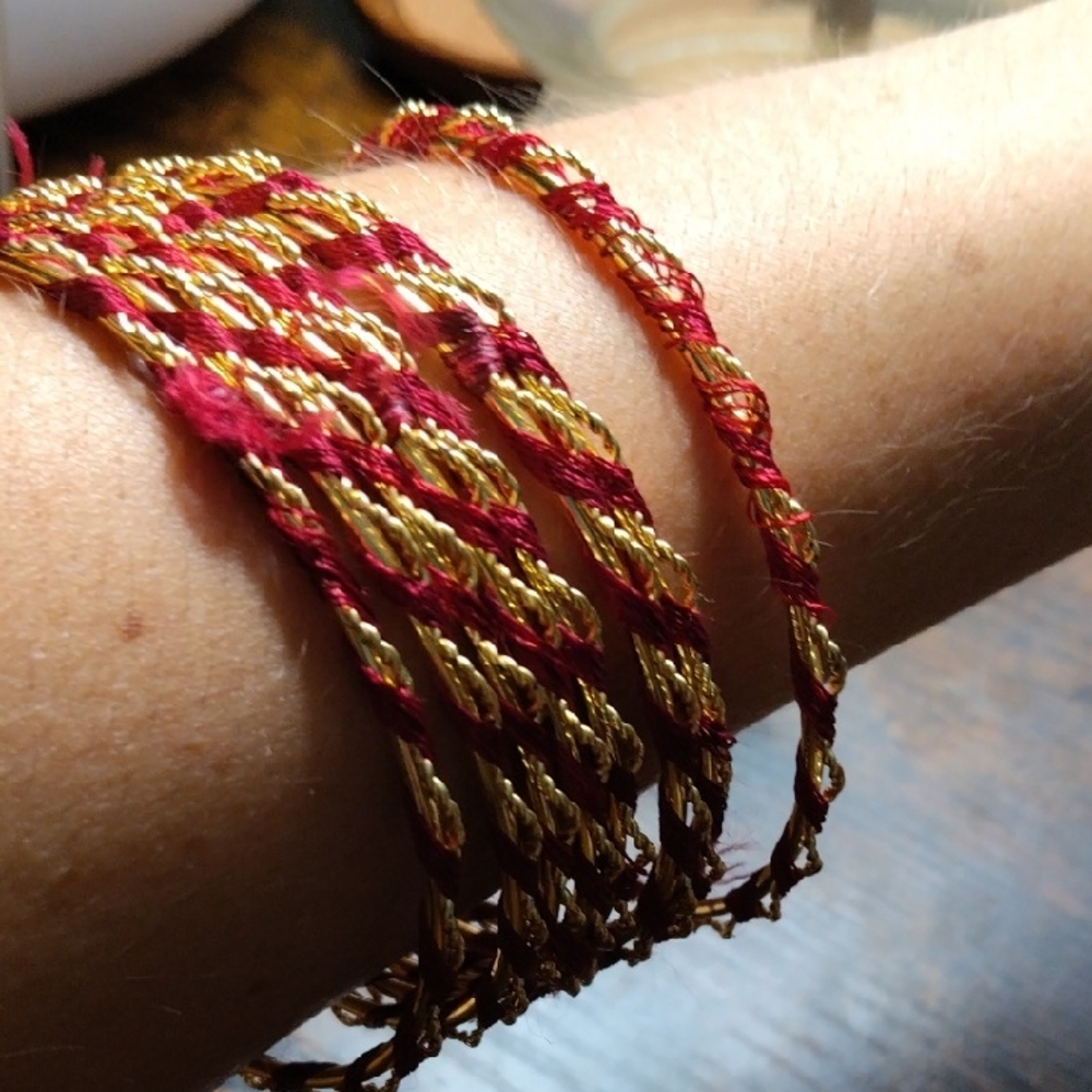 Elegant Gold and Red Twisted Bangles